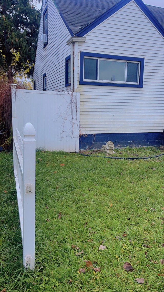 view of home's exterior featuring a lawn