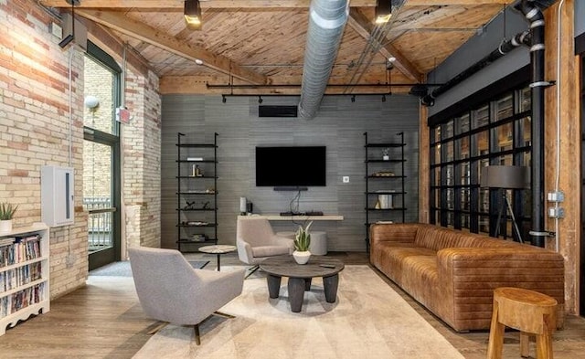 living room featuring brick wall, wood ceiling, beam ceiling, high vaulted ceiling, and hardwood / wood-style floors