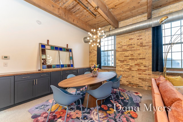 dining space featuring wood ceiling, brick wall, light colored carpet, beam ceiling, and a notable chandelier