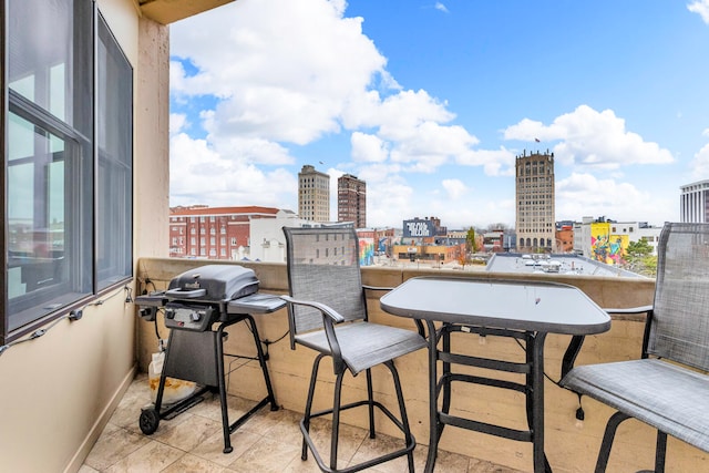 balcony featuring a grill