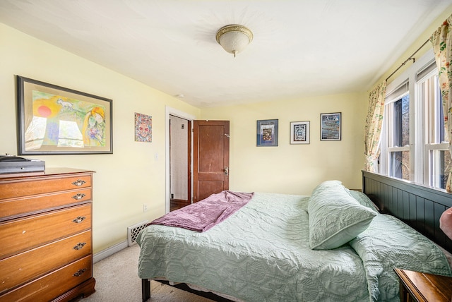 bedroom with light carpet