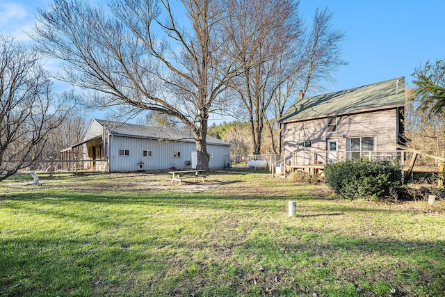 view of yard with a wooden deck