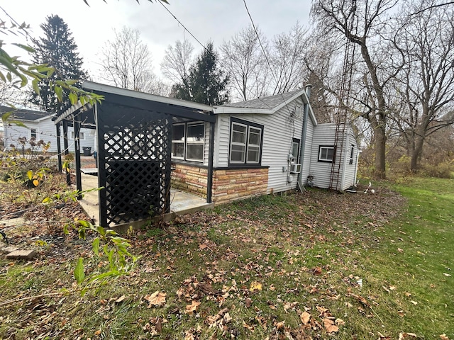 view of side of property featuring cooling unit