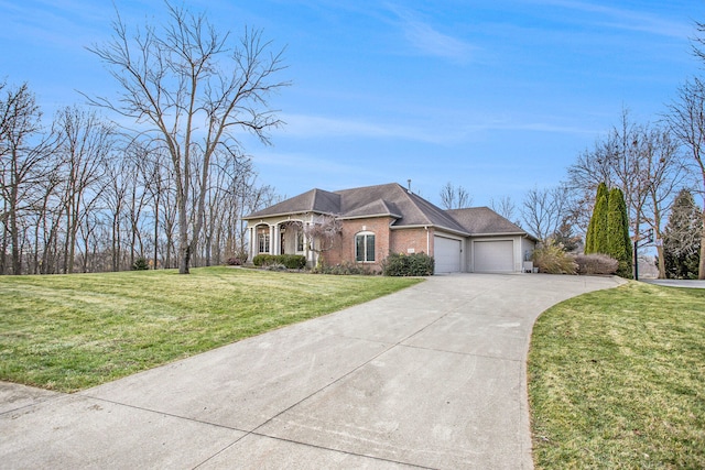 ranch-style house featuring a front yard and a garage