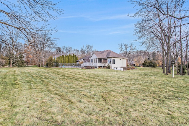 view of yard with a sunroom