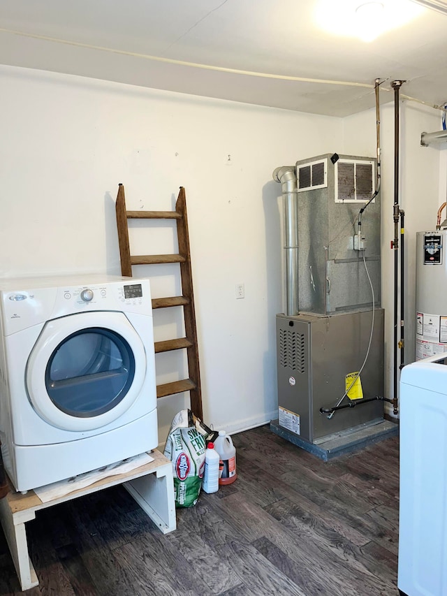 washroom with washer / dryer, water heater, laundry area, and dark wood-style floors