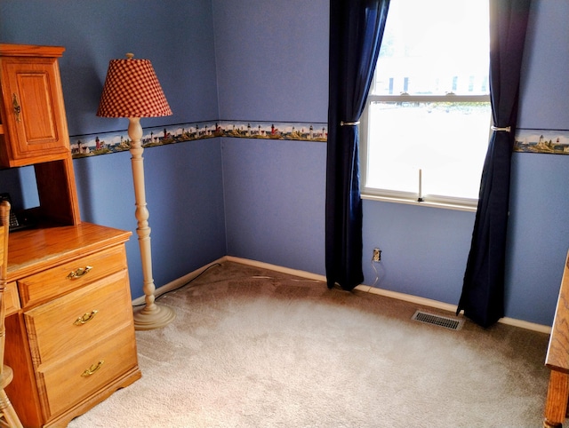 unfurnished bedroom with light carpet