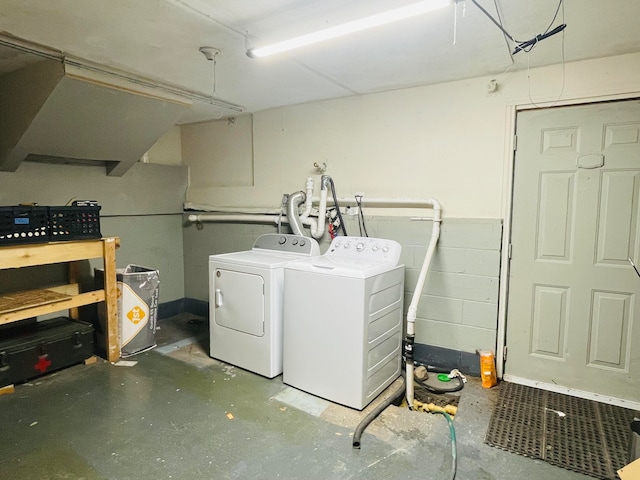 laundry room with separate washer and dryer