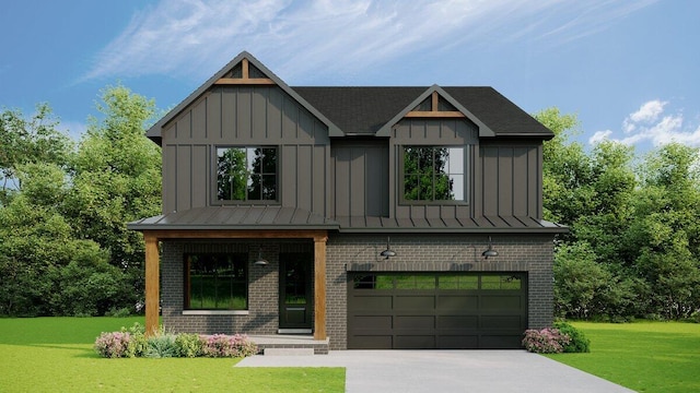 view of front of property with a garage and a front lawn