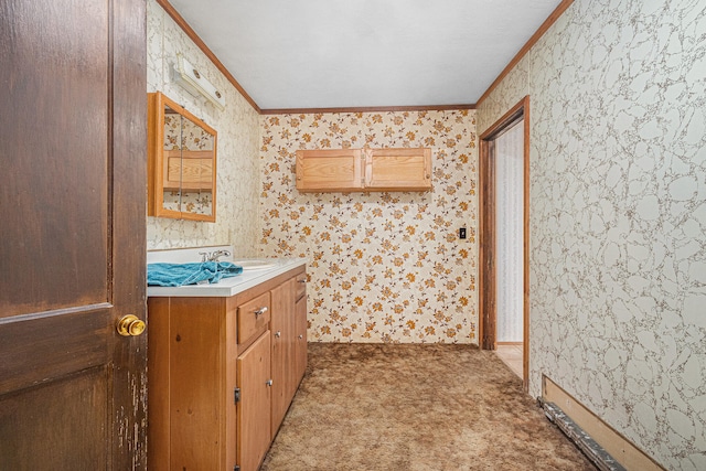 bathroom featuring vanity and crown molding