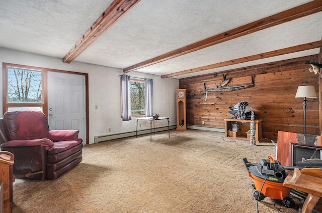 interior space featuring beamed ceiling, a textured ceiling, and a baseboard radiator