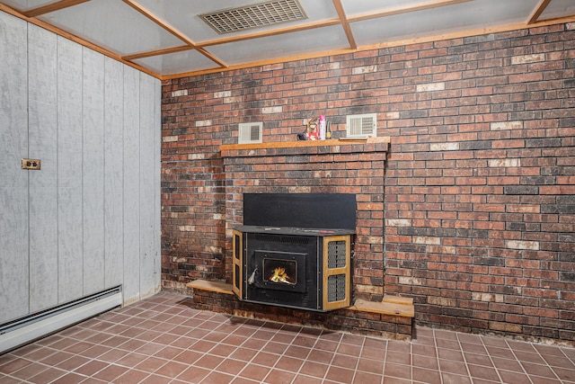 details with wood walls, a wood stove, and a baseboard heating unit