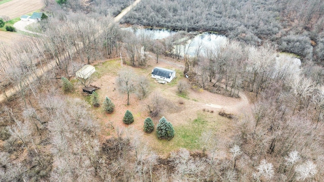 drone / aerial view featuring a water view and a rural view