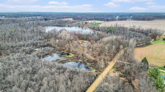 drone / aerial view with a rural view and a water view