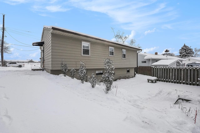 view of snow covered property