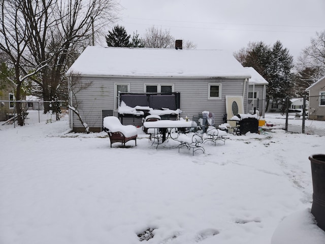 view of snow covered property