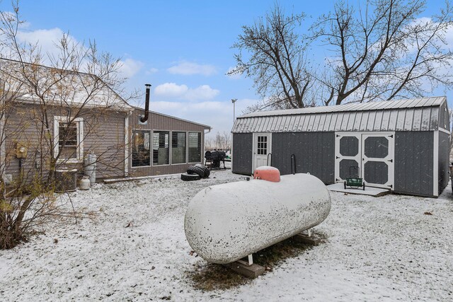 exterior space with a shed