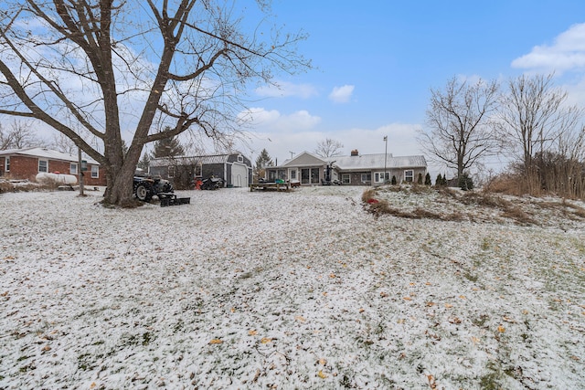 view of snow covered house