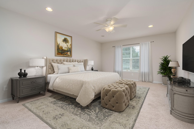 carpeted bedroom featuring ceiling fan