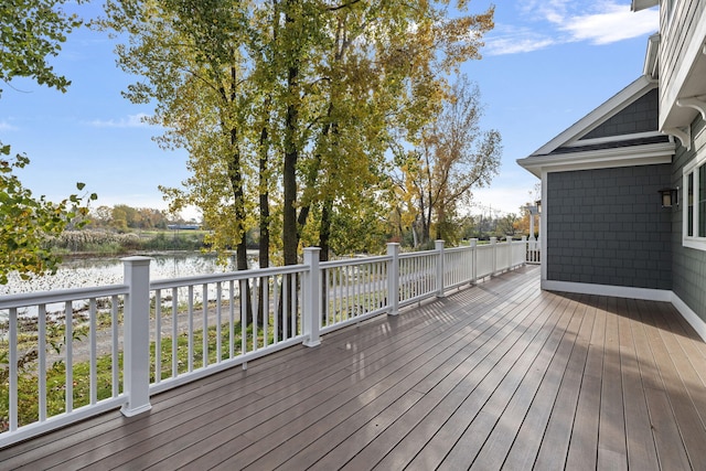 wooden terrace with a water view