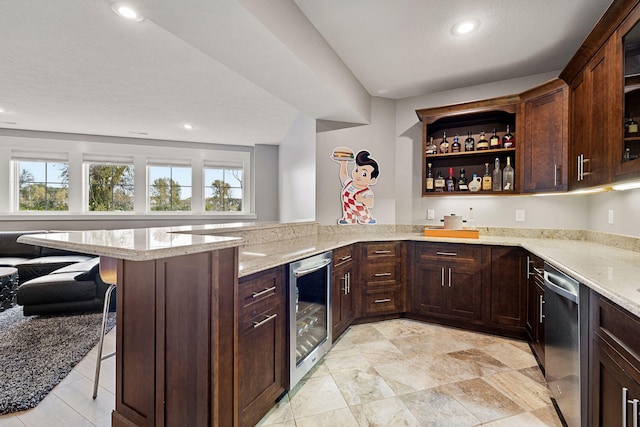 kitchen with wine cooler, open shelves, stainless steel dishwasher, light stone countertops, and a peninsula