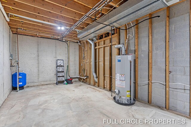 basement featuring water heater