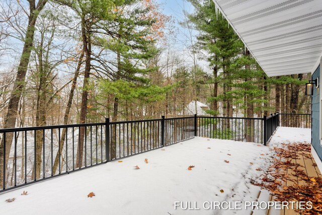 view of snow covered deck