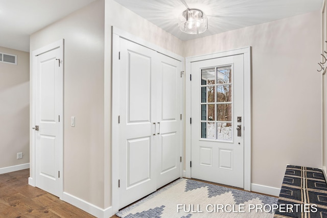 entryway featuring hardwood / wood-style flooring