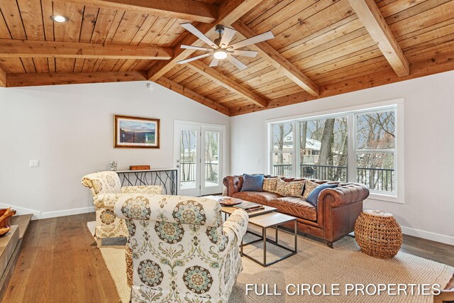 living room featuring vaulted ceiling with beams, wood ceiling, and hardwood / wood-style flooring