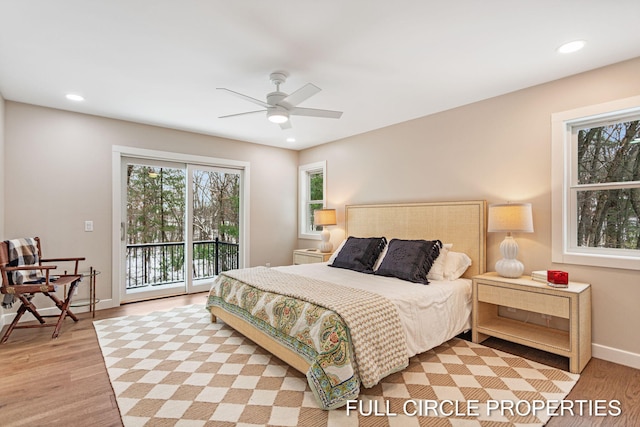 bedroom featuring access to outside, ceiling fan, and light hardwood / wood-style floors