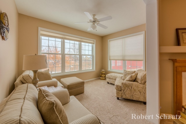 living room featuring ceiling fan and carpet floors