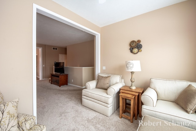 living room featuring light colored carpet