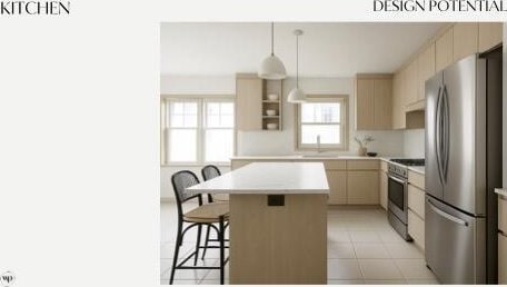 585 Crescent Dr, Holland, MI 49423 - kitchen featuring appliances with stainless steel finishes, a kitchen breakfast bar, light countertops, a center island, and hanging light fixtures