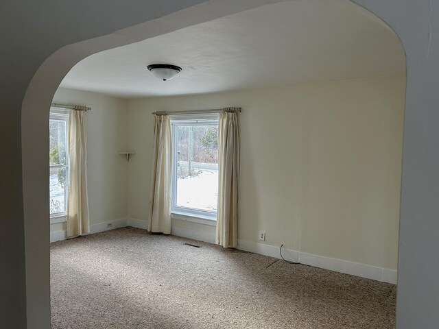 view of carpeted spare room