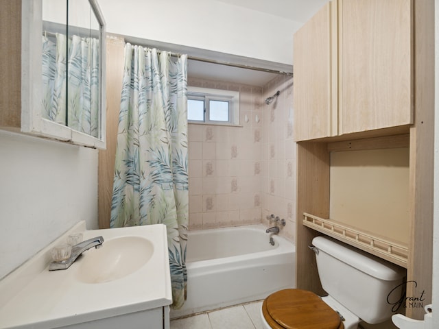 full bathroom featuring tile patterned floors, shower / tub combo with curtain, vanity, and toilet