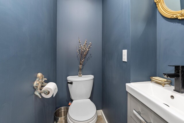 bathroom with toilet and sink