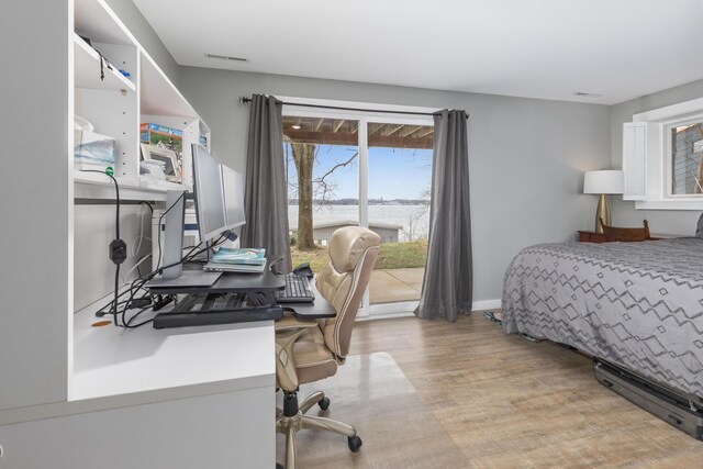 bedroom with light hardwood / wood-style flooring