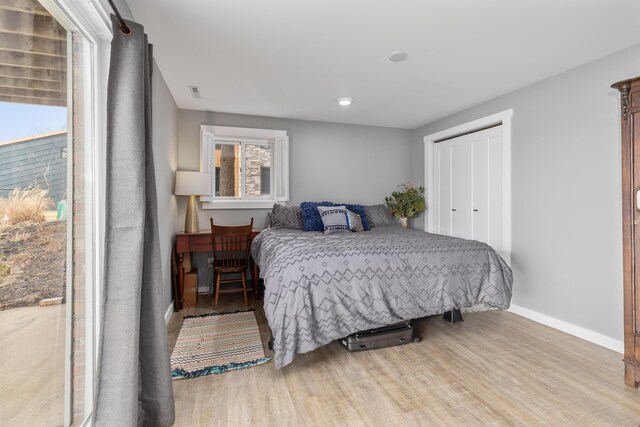 bedroom featuring light hardwood / wood-style flooring