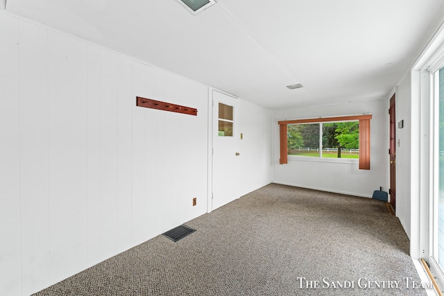 empty room featuring carpet flooring