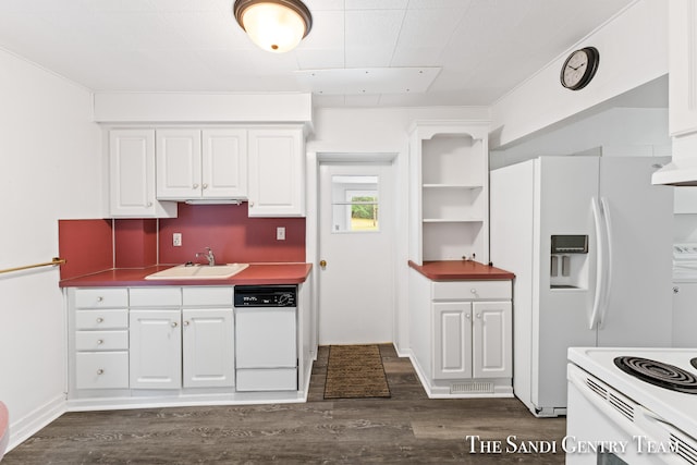 kitchen featuring dark hardwood / wood-style flooring, white cabinetry, sink, and white appliances