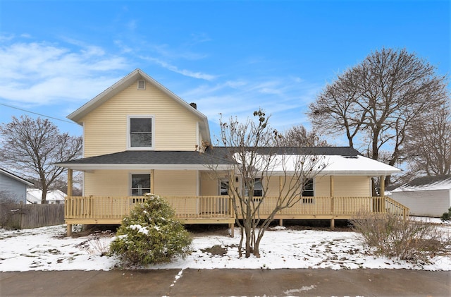 view of snow covered property