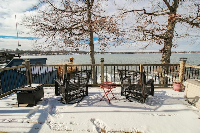 wooden terrace with a water view