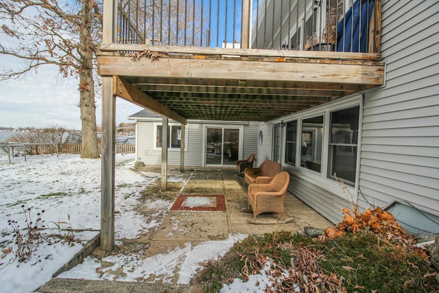 view of snow covered patio