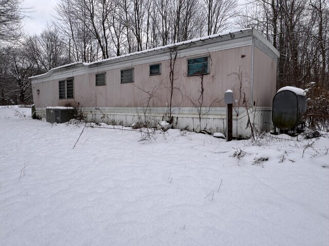 view of snow covered property