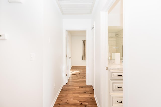 hallway featuring light hardwood / wood-style flooring