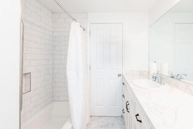 bathroom with vanity and shower / tub combo