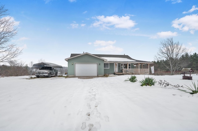 view of front facade with a garage, a porch, and a carport