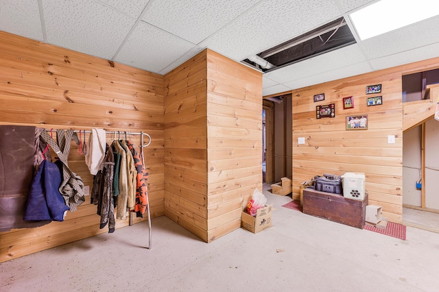 interior space featuring a drop ceiling