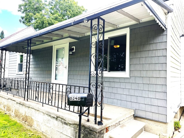 doorway to property with a porch