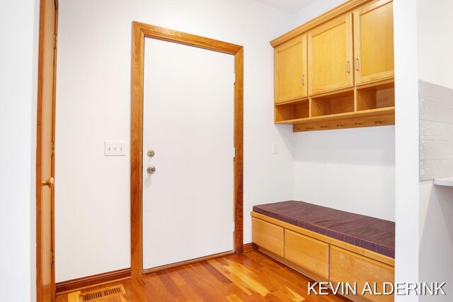 mudroom with light wood-type flooring